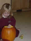 Liza WIth Her Hands in the Pumpkin.jpg (25499 bytes)