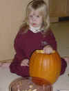 Liza and her pumpkin.jpg (28594 bytes)